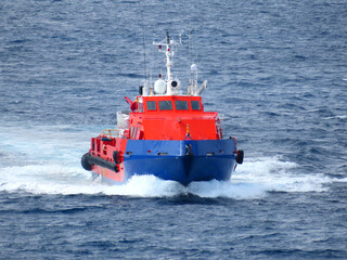 Supply boat transfer the cargo for supporting oil and gas industry and moving cargo from the boat...