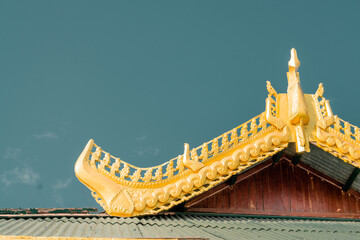 wooden craft   art  of   Burma  temple  roof