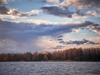 autumn landscape. Forest, river and field in late autumn.