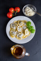 Ravioli with ricotta, spinach and basil in a white plate