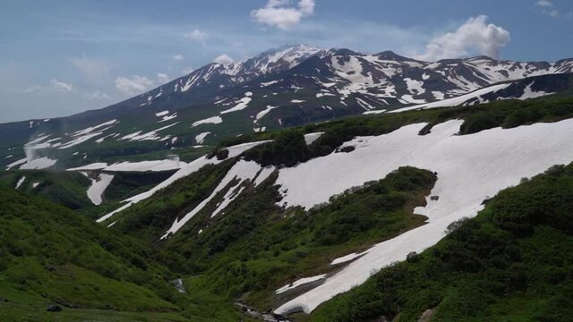 Steam-gas emission at the Mutnovsky volcano in Kamchatka in Russia.
