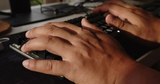 Close up fingers hands of business man user worker using typing buttons on pc keyboard at home office desk, Unknown person pushing keys on computer keyboard