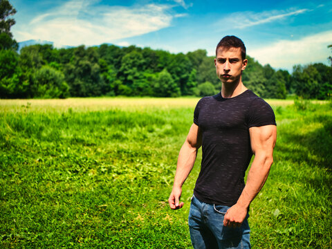 Handsome Muscular Hunk Man Outdoor in Park