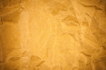 Crumpled brown paper texture.