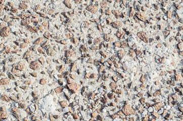 Light grey cement with rubbles texture
