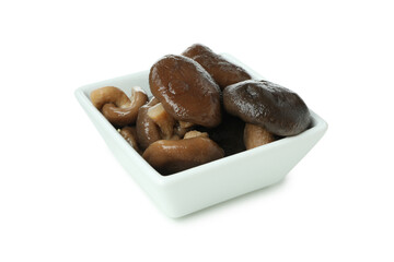 Tasty marinated mushrooms isolated on white background