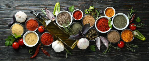 Concept of aromatic spices on rustic wooden table