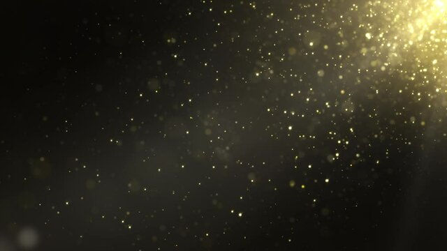 Seamless background animation of slowly flying gold dust particles on a dark background with shallow depth of field. Abstract dark particle looped background futuristic concept with bokeh