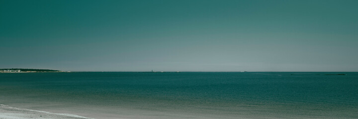Obraz premium Turquoise colored seascape at dusk in the Atlantic Ocean