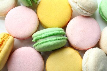 Concept of tasty dessert with macaroons, close up