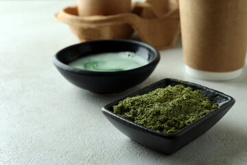 Concept of japanese tea with matcha on white textured table