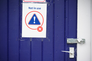 Not in use sign on door at train station