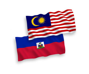 Flags of Republic of Haiti and Malaysia on a white background