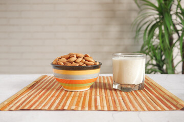  almond nut and milk on table 