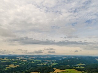 Fototapeta premium The Fröbelblick is a picturesque vantage point in the Thuringian Forest, from which you can enjoy a wonderful view over the entire Rinnetal and the surrounding mountains.