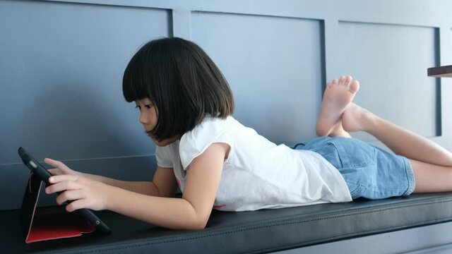 kid watching tablet , child addicted cartoon
