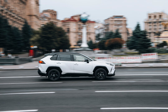 Ukraine, Kyiv - 2 June 2021: White Toyota RAV 4 car moving on the street. Editorial