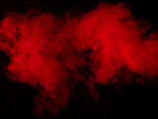 Red smoke on black background