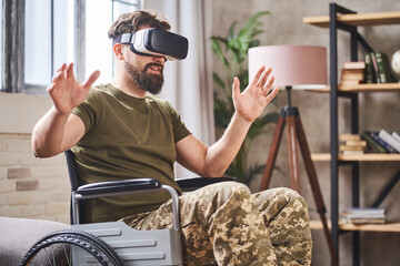 Disabled ex-serviceman in a wheelchair using a VR headset