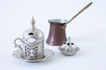 Turkish coffee and turkish delight set on white background.