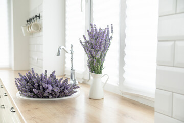 A bouquet of lavender in the interior of a stylish kitchen.