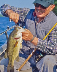 Angler with a sizable largemouth bass 
