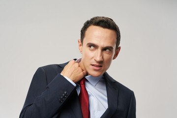 emotional kilogram man straightens collar official manager office