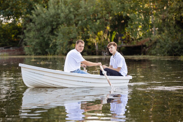 Fototapeta na wymiar Two men on a boat