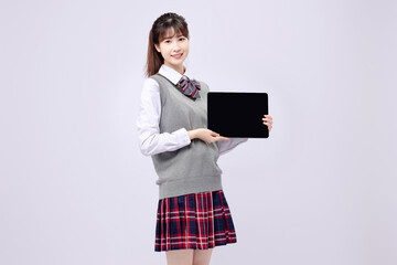 Beautiful Asian girl in middle school uniform