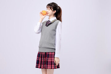 Beautiful Asian girl in middle school uniform