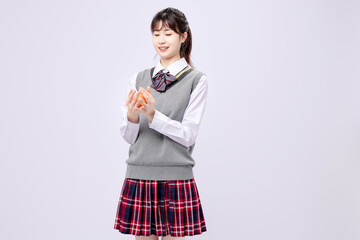 Beautiful Asian girl in middle school uniform
