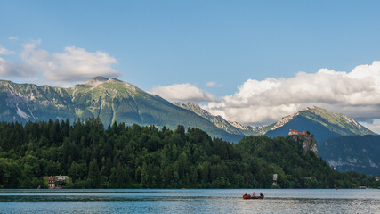 View of the beautiful Lake Bled in Slovenia, Julian Alps and green forests.