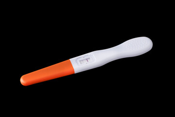 Positive pregnansy test isolated on black.