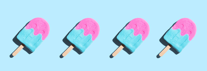 Pink and blue popsicles with shadow