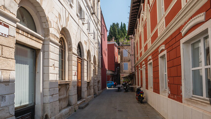 Fototapeta na wymiar Old and narrow street in Piran, Slovenia