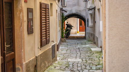 Old and narrow street in Piran, Slovenia
