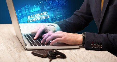 Obraz na płótnie Canvas Businessman working on laptop concept