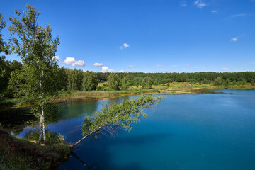 Beautiful summer landscape near lake with blue water. Lake Key in the Nizhny Novgorod region.