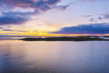 The Clouds over the lake panorama aerial. Evening landscape aerial. Aerial panorama. Clouds on the river in the evening.