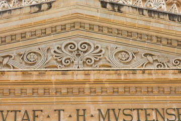detail of the facade of the basilica of saint peter