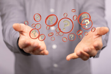 Businessman solving problem with digital question marks 3D rendering