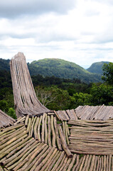 Hanging wood and bamboo makeshift viewing deck on a mountain edge