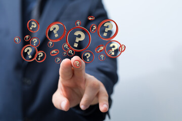 Businessman solving problem with digital question marks 3D rendering