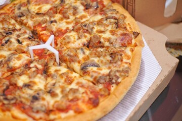 Close up of pizza and side dish from several angle