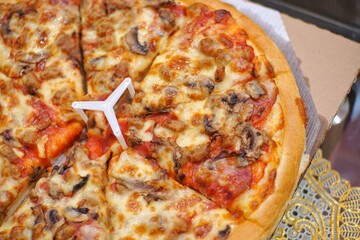 Close up of pizza and side dish from several angle