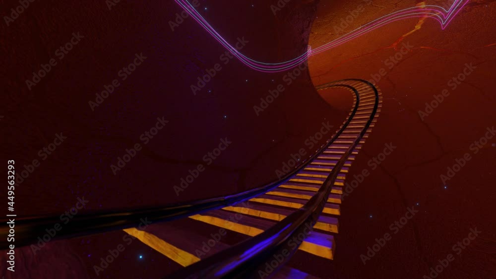 Poster flight of the camera over the rails of the railway located in the tunnel. looped abstract animation.