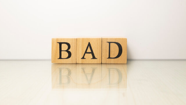 The name Bad was created from wooden letter cubes. finance and economy.