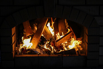 fire in fireplace
fireplace with fire
fireplace with burning logs
