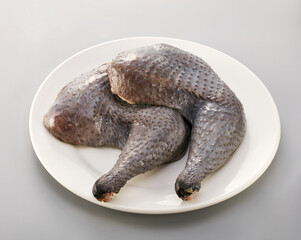 Fresh ingredients, closeup fresh black chicken leg