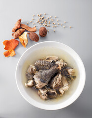 Delicious black chicken medicated soup